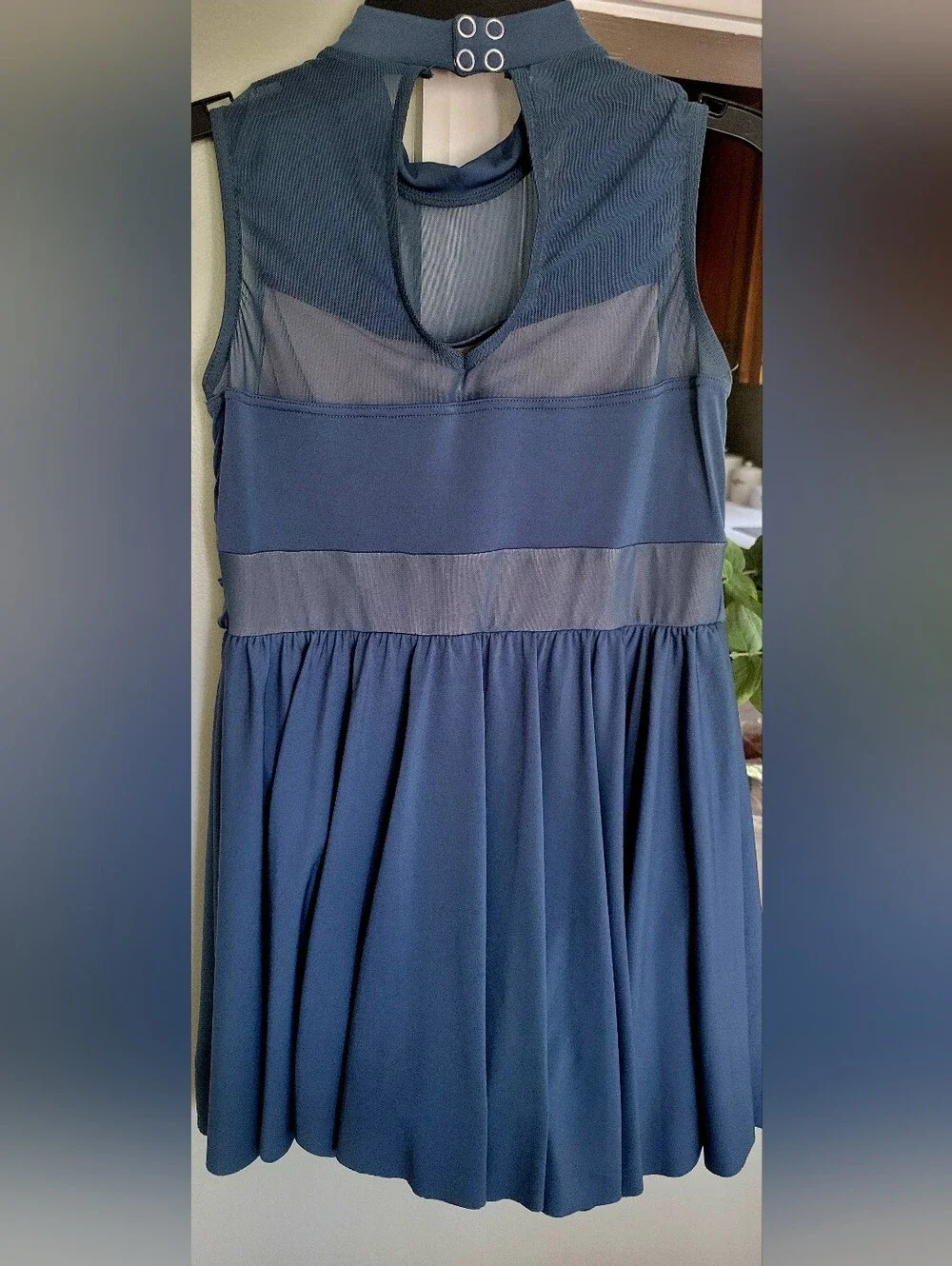 Unique Green Colored Costume With Twist-Front And Flowy Skirt